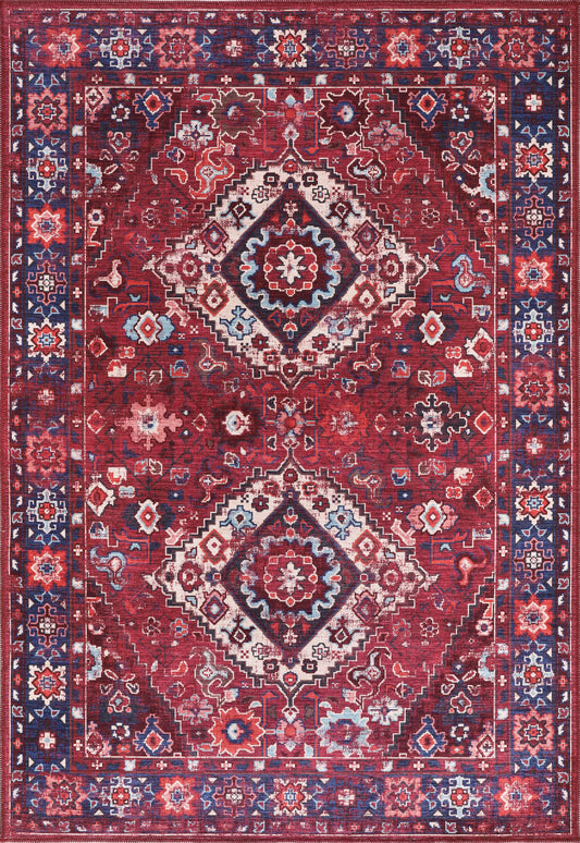 Decorative rug with intricate patterns in red, blue, and beige.