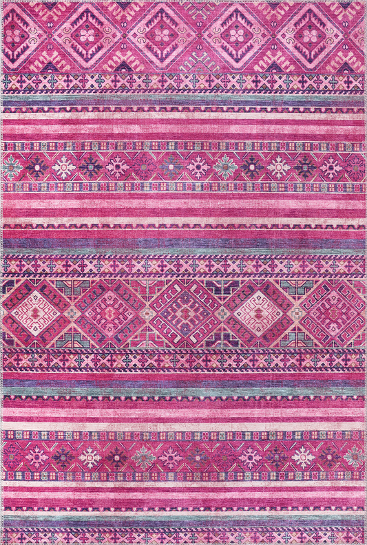 Patterned fabric with pink and purple stripes and geometric designs.