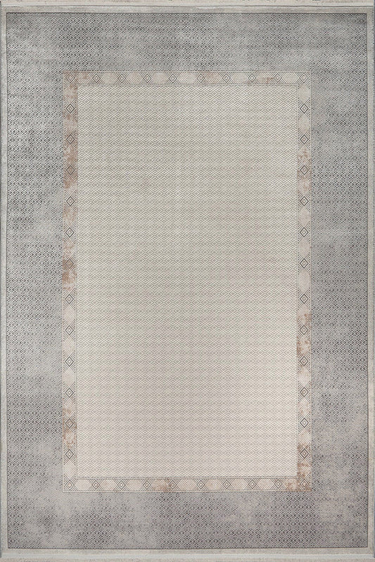 Rectangular area rug with a geometric pattern on a plain background