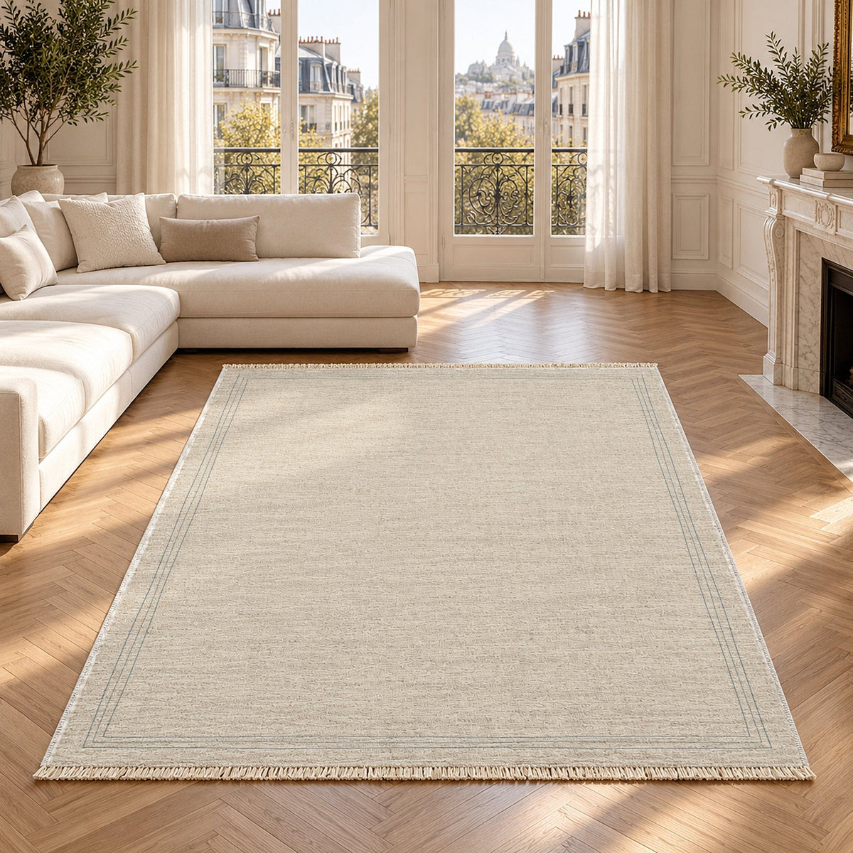 Pencil Edge Ivory & Dusty Blue Bordered Washable Rug in a bright living room
