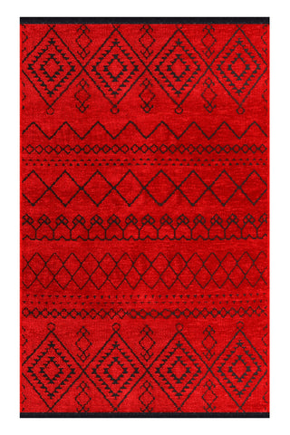 Red rug with black geometric pattern on a white background