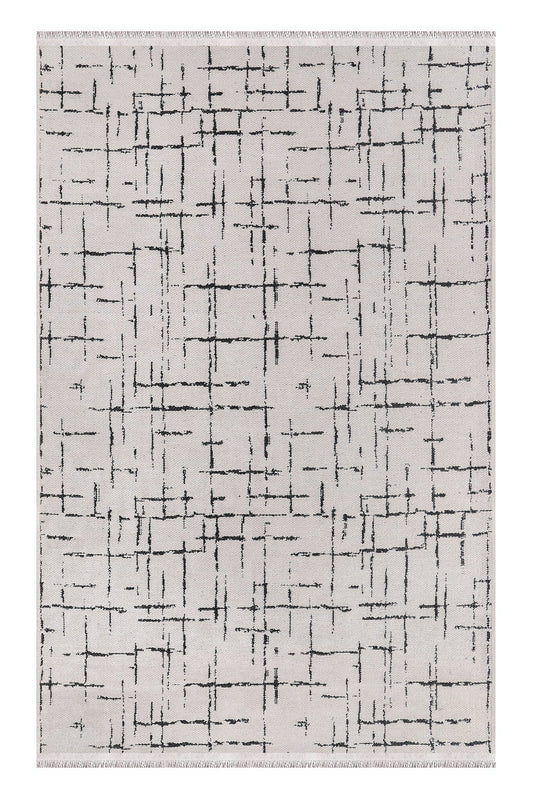 Rug with abstract black pattern on a white background