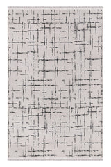 Rug with abstract black pattern on a white background
