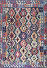 Multicolored geometric patterned rug on a blue background