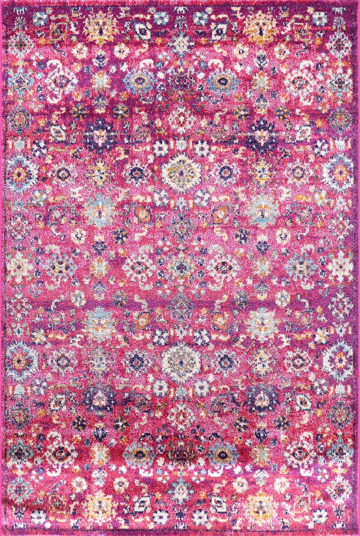 Colorful floral patterned rug on a pink background
