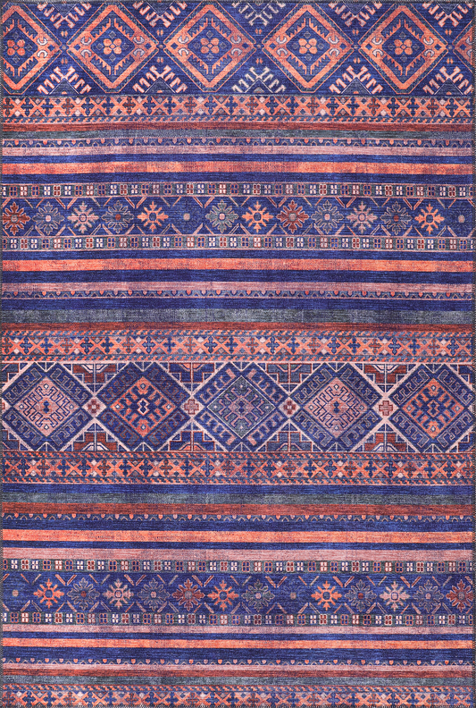 Patterned rug with blue and orange stripes and geometric designs.