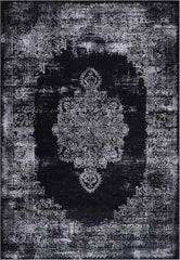 Decorative black and white rug with intricate patterns