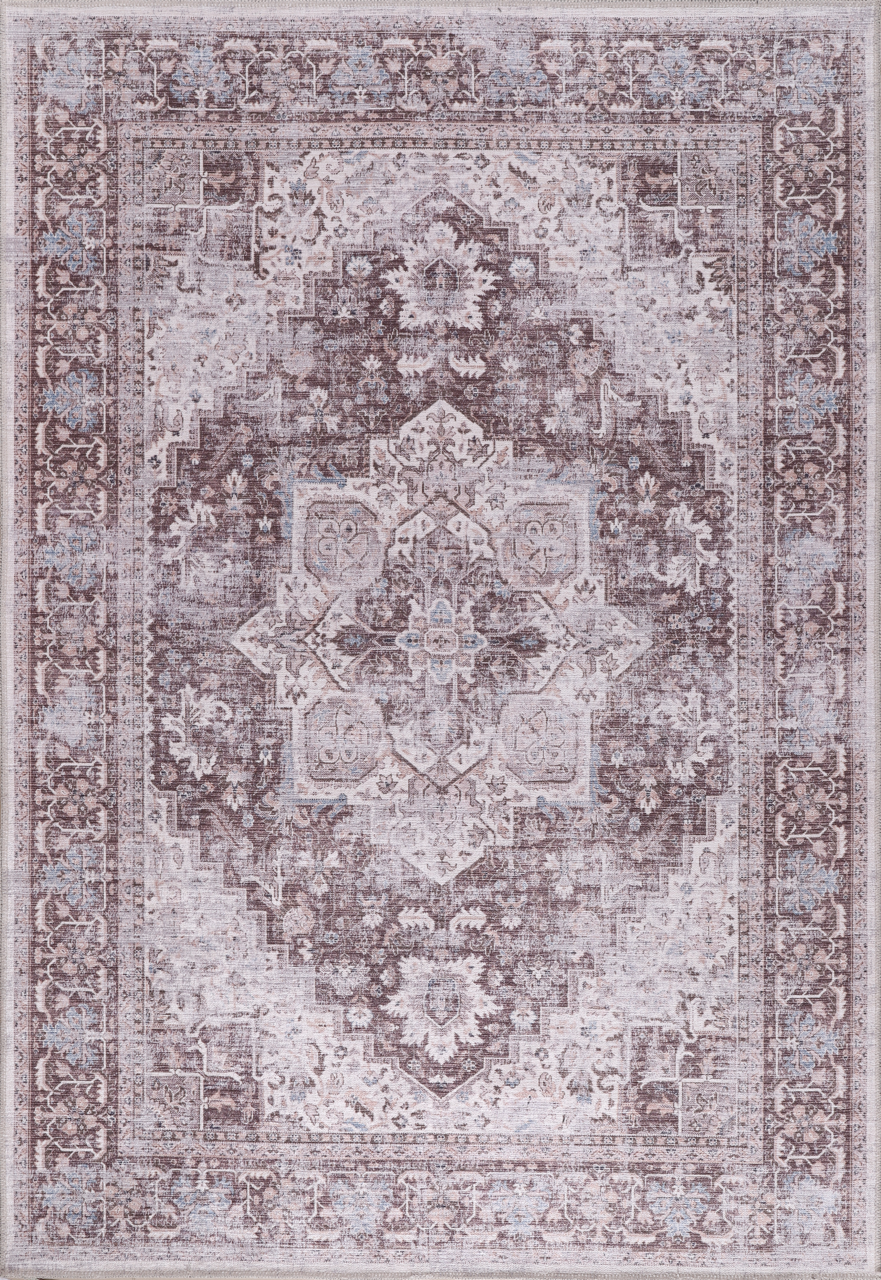 Decorative rug with intricate pattern on a light gray background