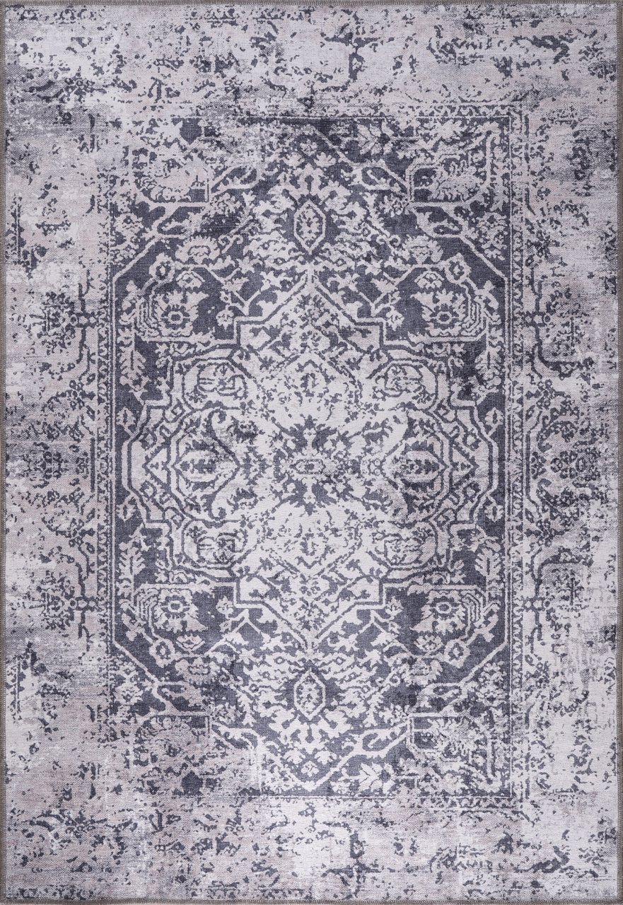 Decorative rug with intricate pattern on a light gray background