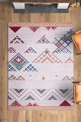 Geometric patterned rug on a wooden floor with furniture around