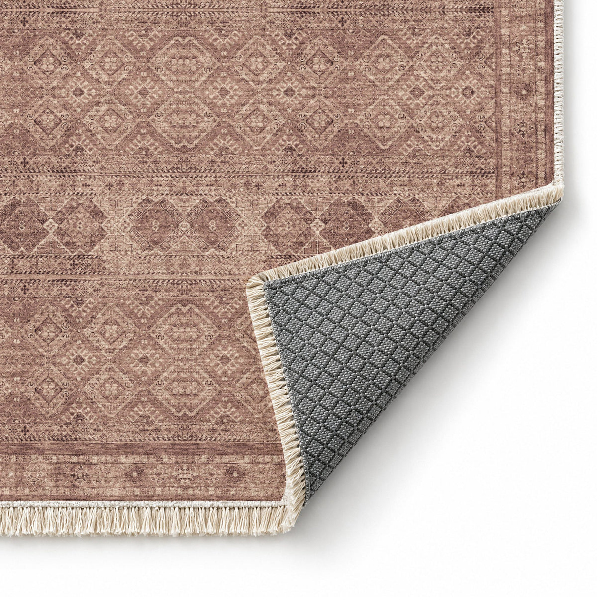 Anatolian Tonal Clay & Rose washable rug folded corner showing the backing