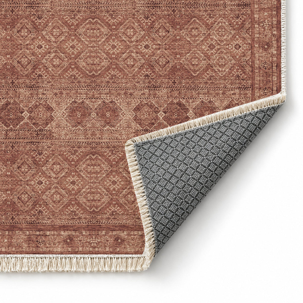 Anatolian Tonal Faded & Madder washable rug folded corner showing the backing