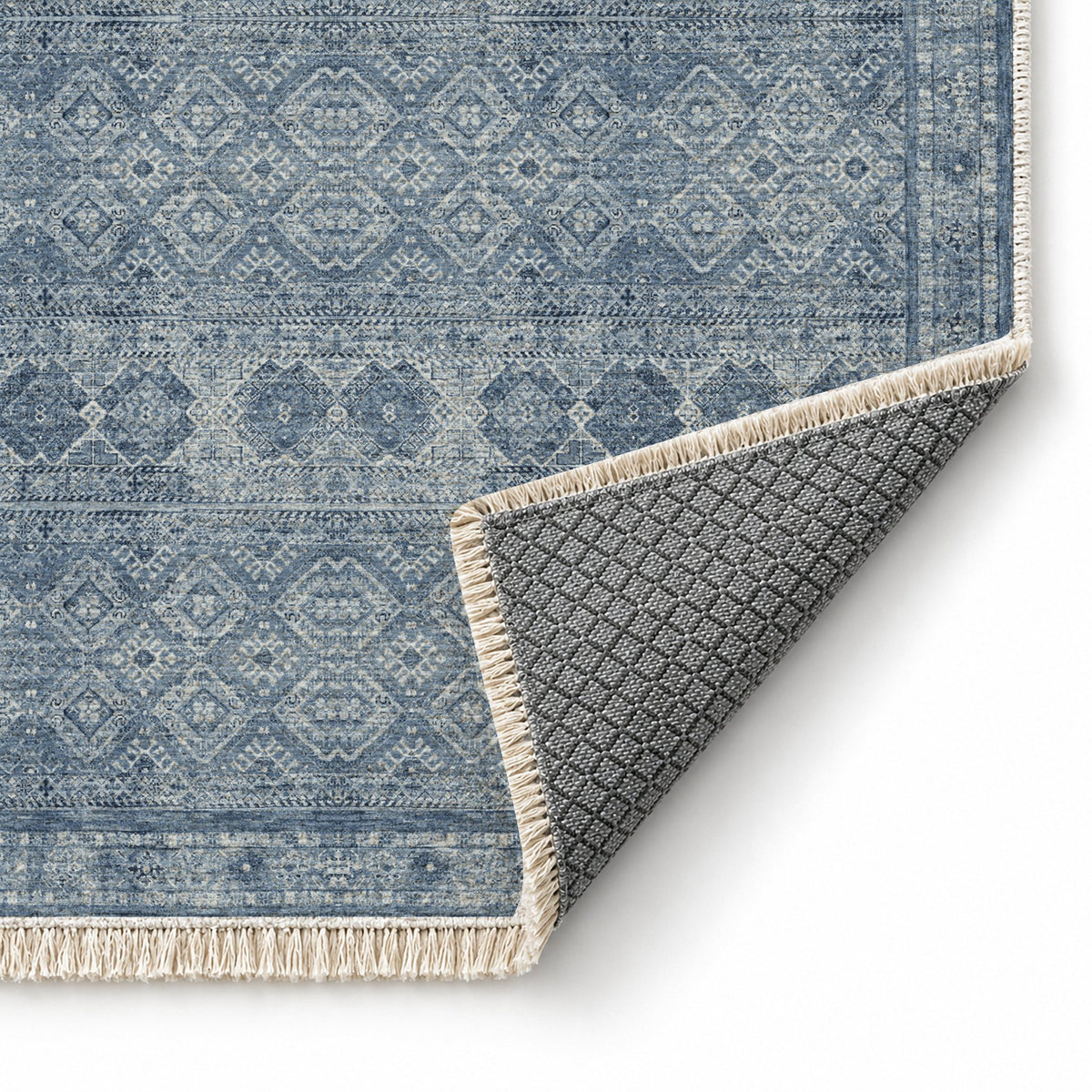 Anatolian Tonal Indigo & Ash washable rug folded corner showing the backing