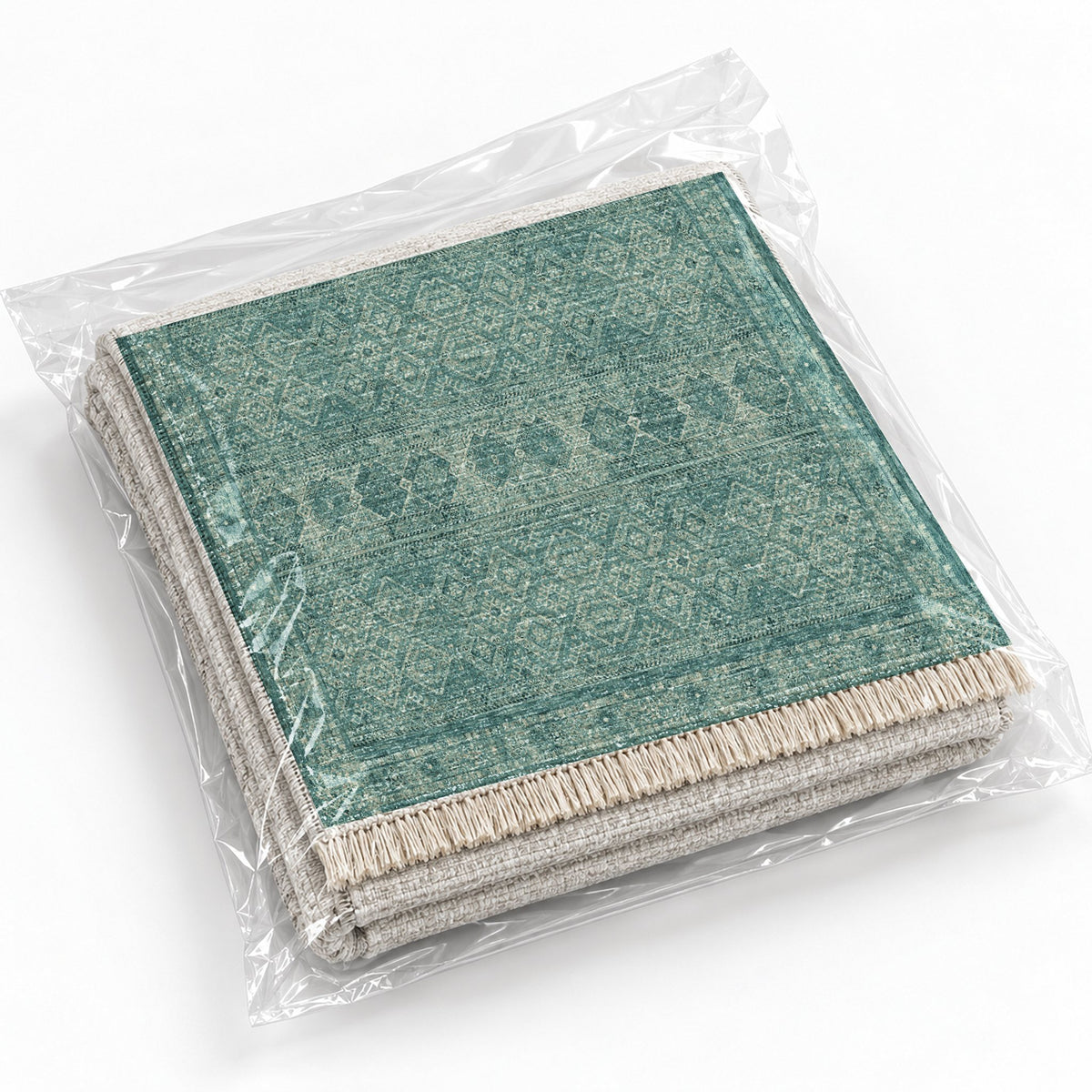 Anatolian Tonal Petrol & Sand washable rug rolled and packaged