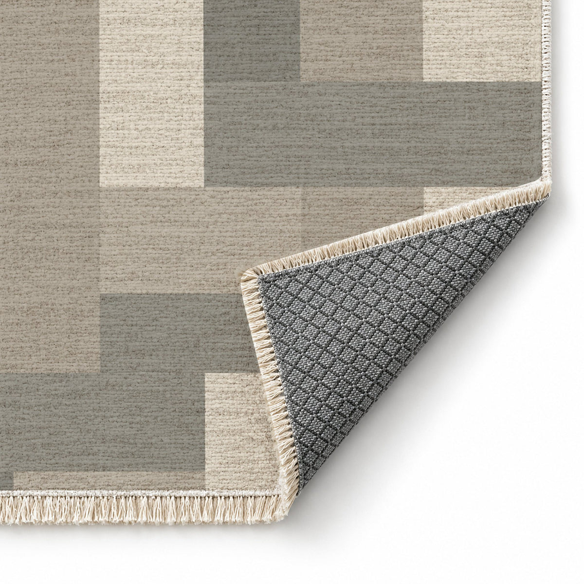 Basket Rhythm Greige & Stone washable rug folded corner showing the backing