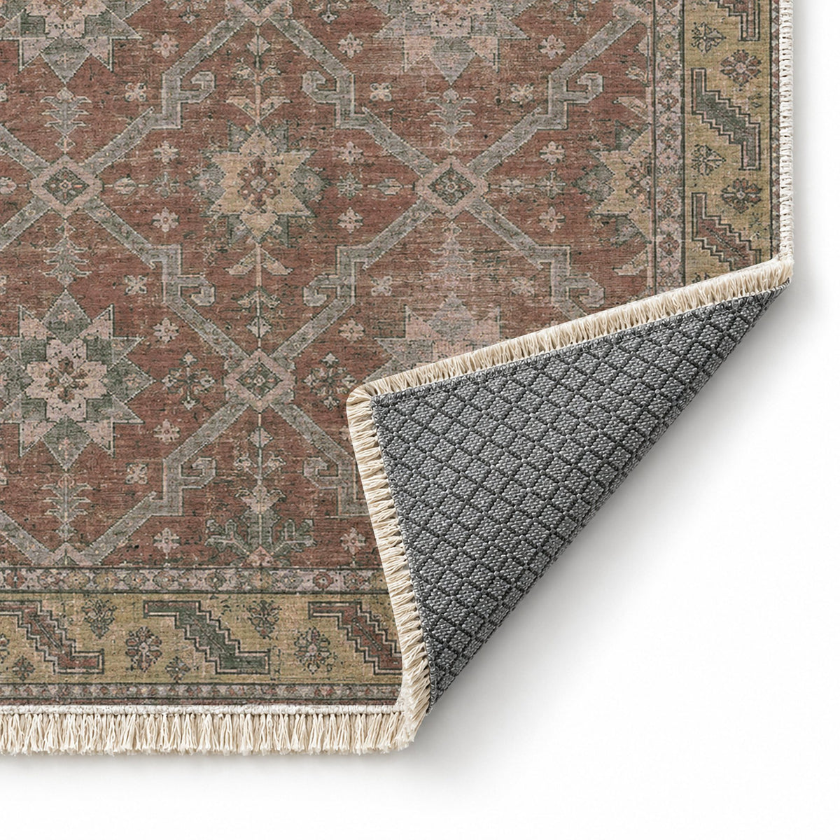 Beysehir Stars Graphite & Linen washable rug folded corner showing the backing