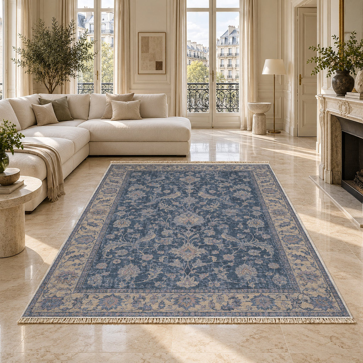 Bird Arabesque Mineral Blue washable rug on a marble floor