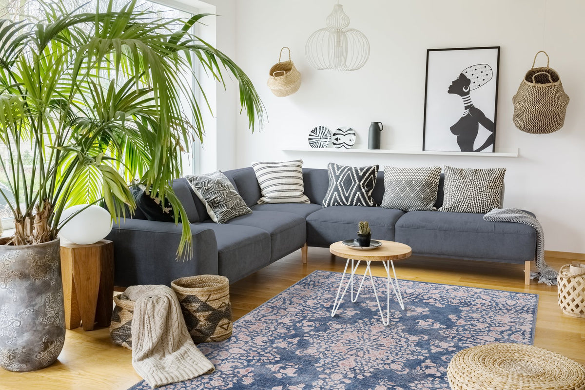 Blue & Blush Floral Medallion Washable Rug in a living room