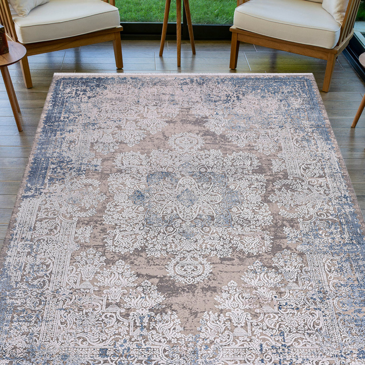Blue & Ivory Distressed Medallion Area Rug in a living room