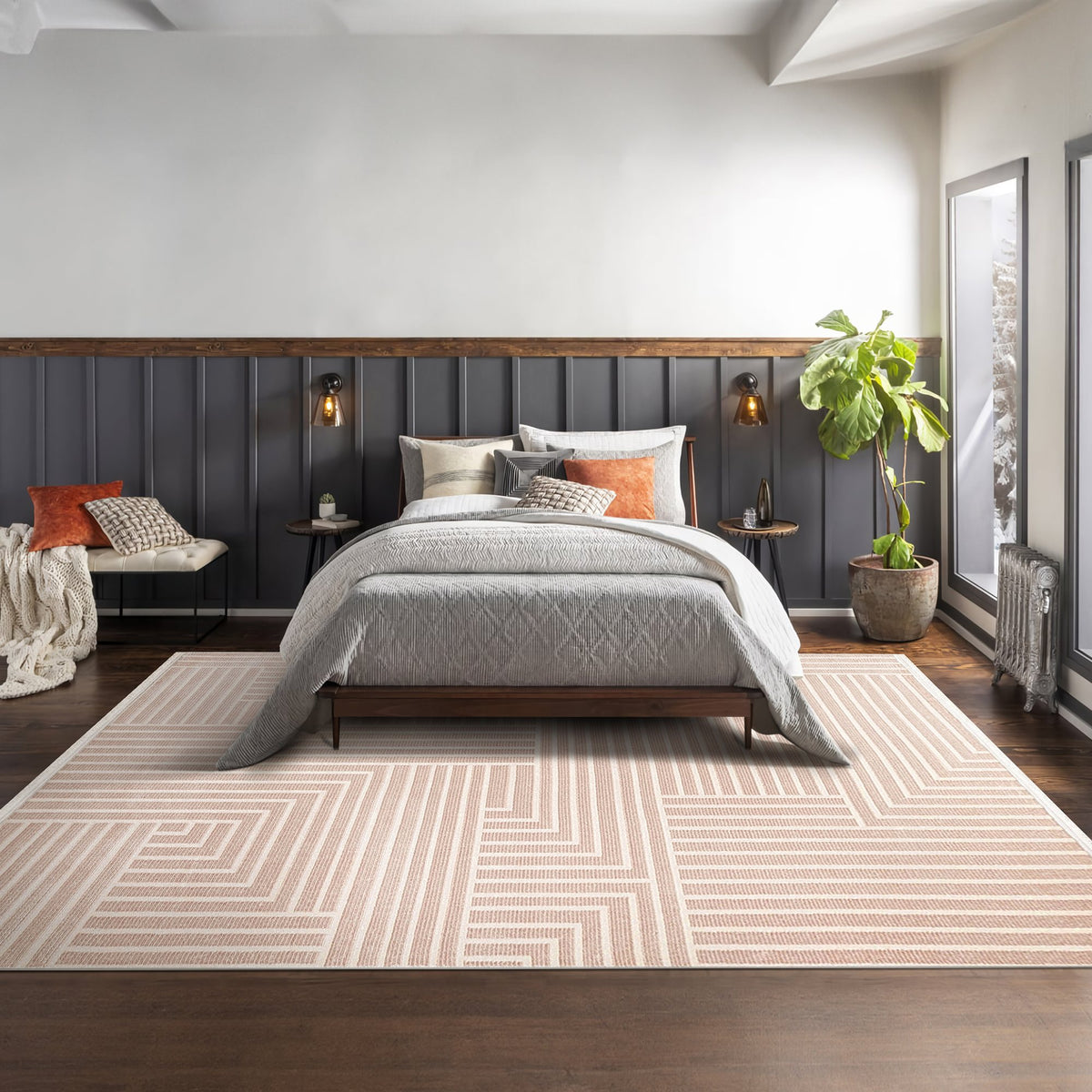 Blush Linear Geometric Area Rug in a living room