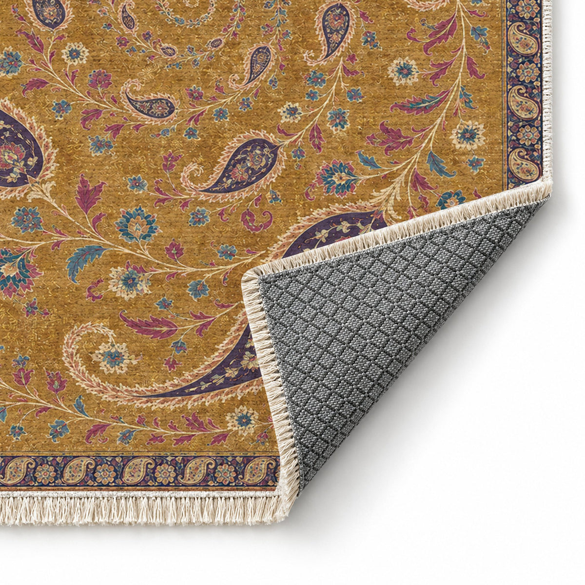 Boteh Wind Spiral Golden, Plum & Azure washable rug folded corner showing the backing
