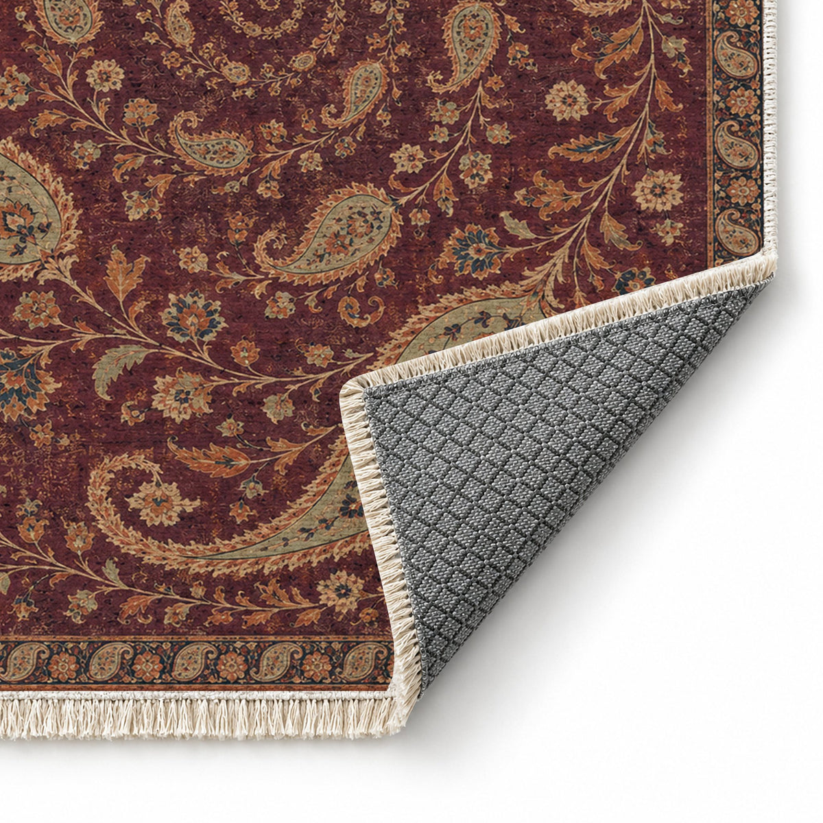 Boteh Wind Spiral Mulberry & Celadon washable rug folded corner showing the backing