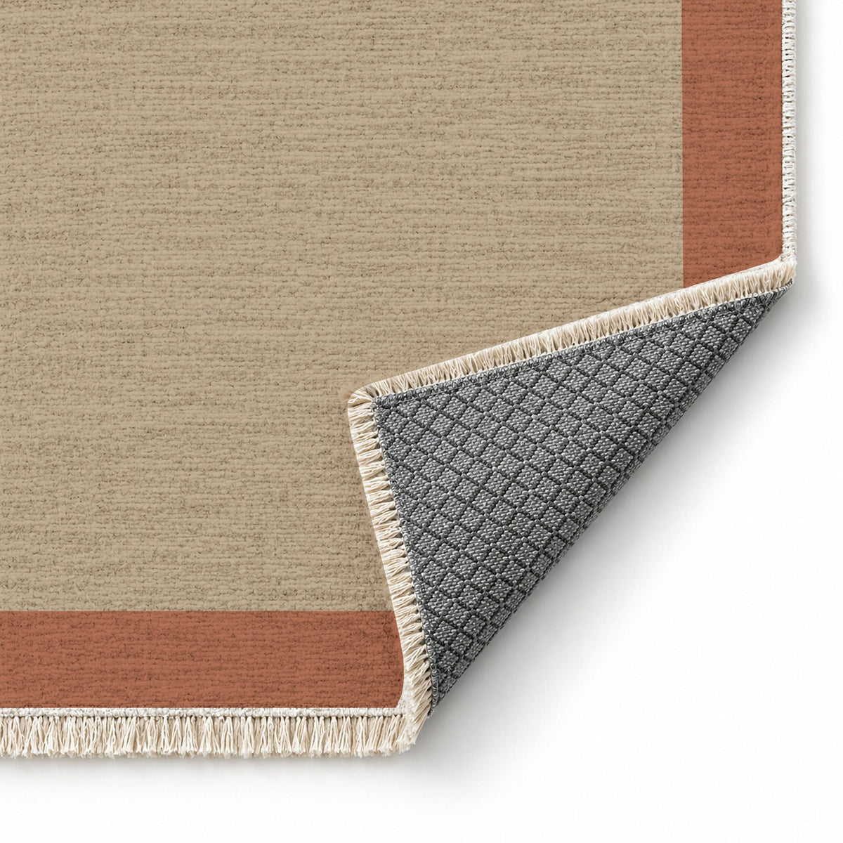 Broad Gallery Sand & Terracotta washable rug folded corner showing the backing
