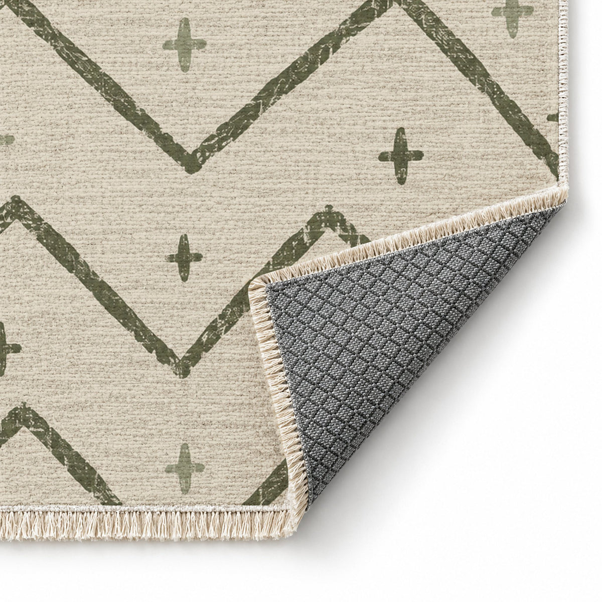 Broken Chevron Ivory & Olive washable rug folded corner showing the backing