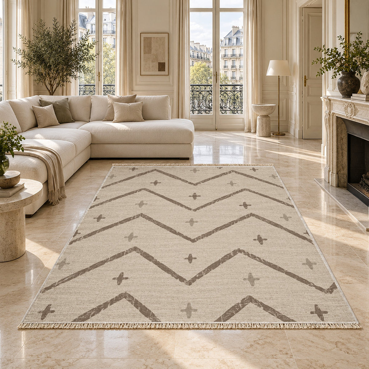 Broken Chevron Ivory & Taupe washable rug on a marble floor