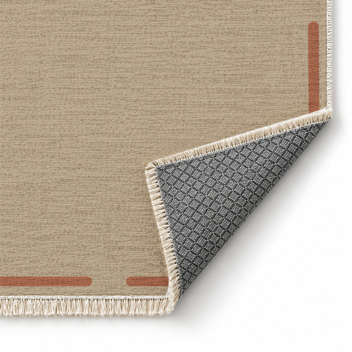 Broken Frame Sand & Terracotta washable rug folded corner showing the backing