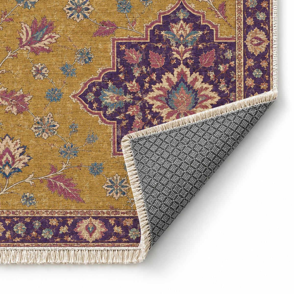 Broken Star Diagonal Golden, Plum & Azure washable rug folded corner showing the backing