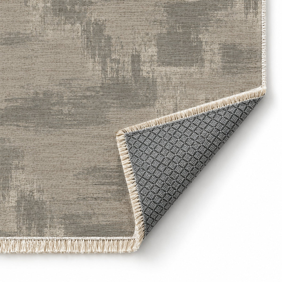 Brushed Plain Greige & Stone washable rug folded corner showing the backing