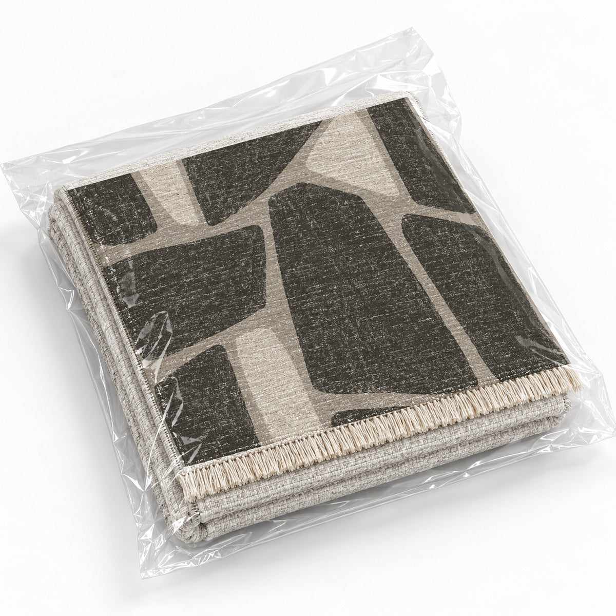 Chalk Fragment Greige & Charcoal washable rug rolled and packaged