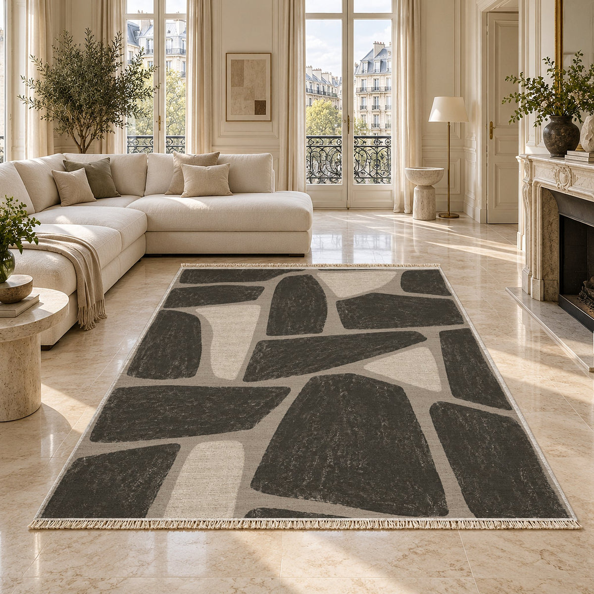 Chalk Fragment Greige & Charcoal washable rug on a marble floor