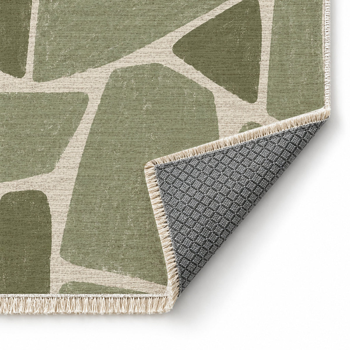 Chalk Fragment Ivory & Sage washable rug folded corner showing the backing