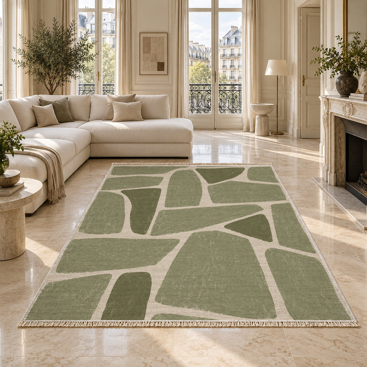 Chalk Fragment Ivory & Sage washable rug on a marble floor
