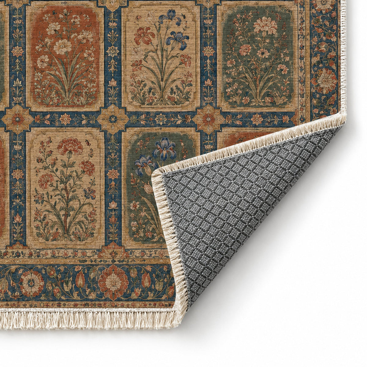 Charbagh Indigo & Rust washable rug folded corner showing the backing