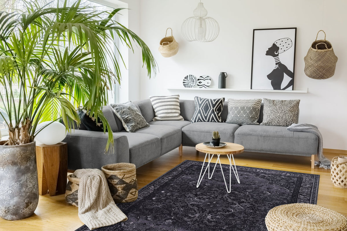 Charcoal Black Distressed Medallion Washable Rug in a living room
