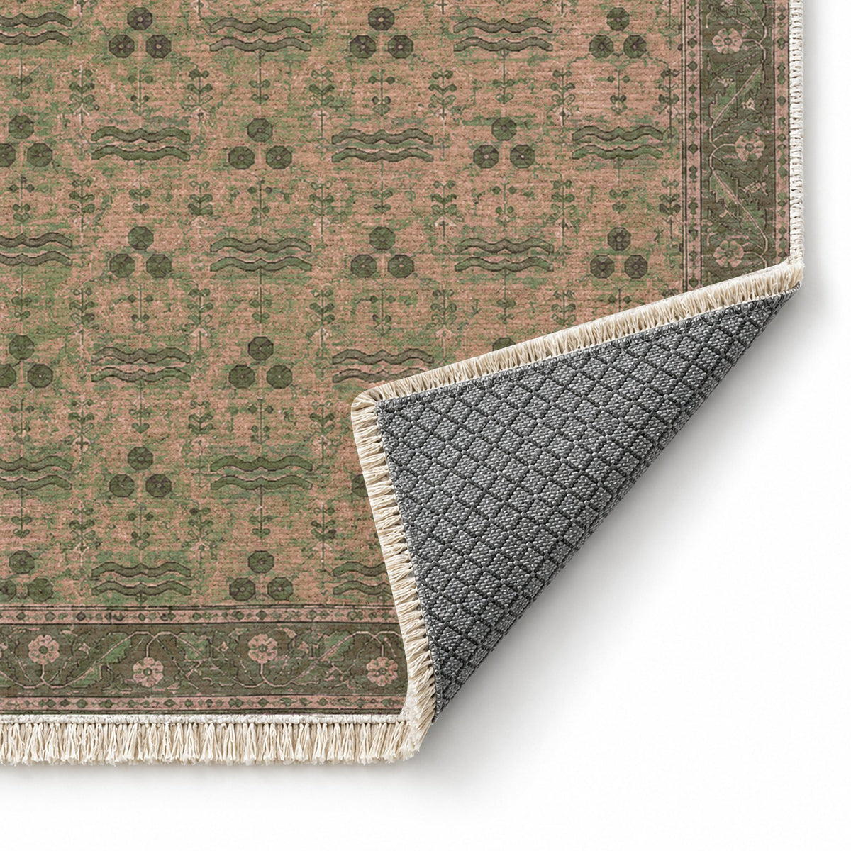 Chintamani Garden Rose & Olive washable rug folded corner showing the backing
