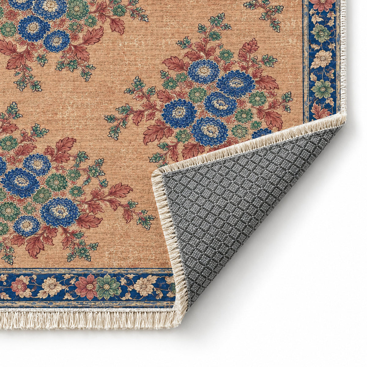 Chrysanthemum Islands Peach, Cobalt & Jade washable rug folded corner showing the backing