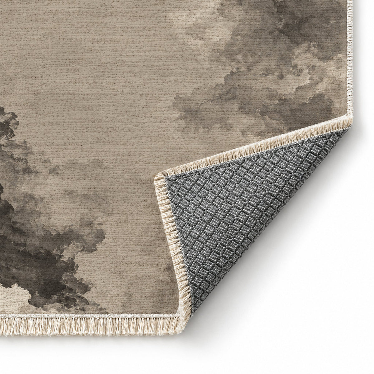 Cloud Wash Greige & Charcoal washable rug folded corner showing the backing