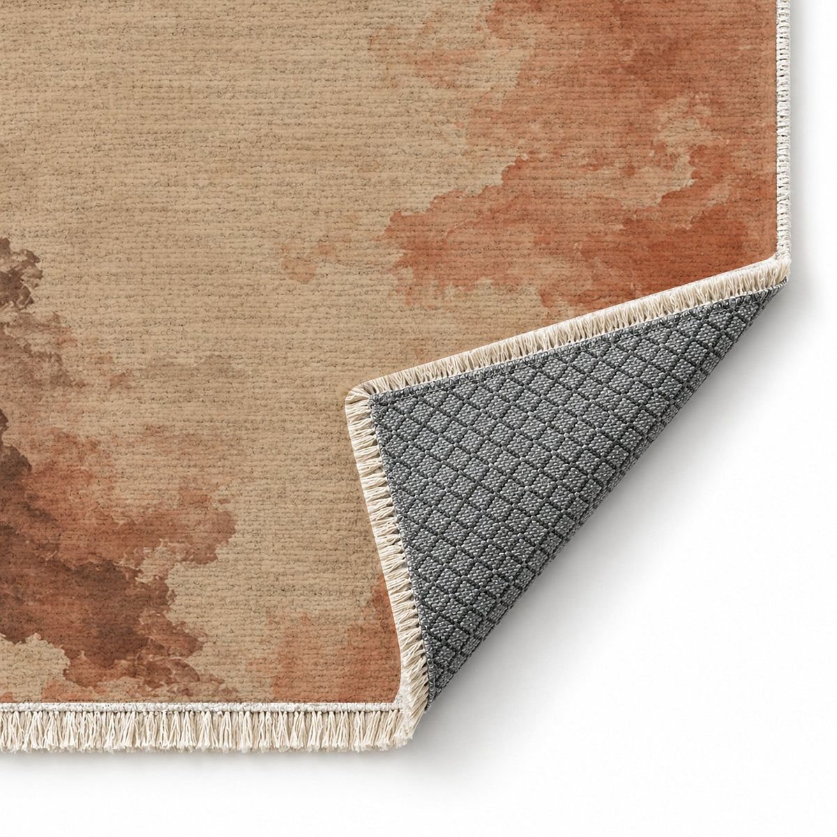 Cloud Wash Sand & Terracotta washable rug folded corner showing the backing