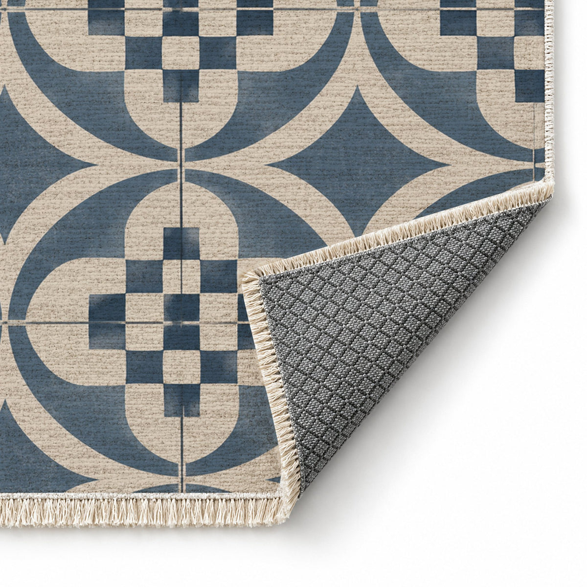 Courtyard Tile Ivory & Denim washable rug folded corner showing the backing