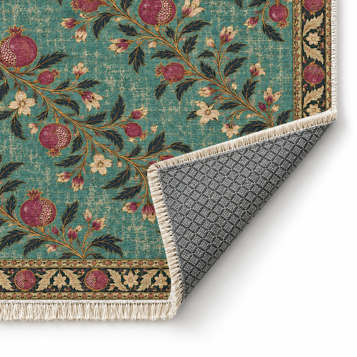 Diagonal Pomegranate Canopy Lagoon & Berry washable rug folded corner showing the backing