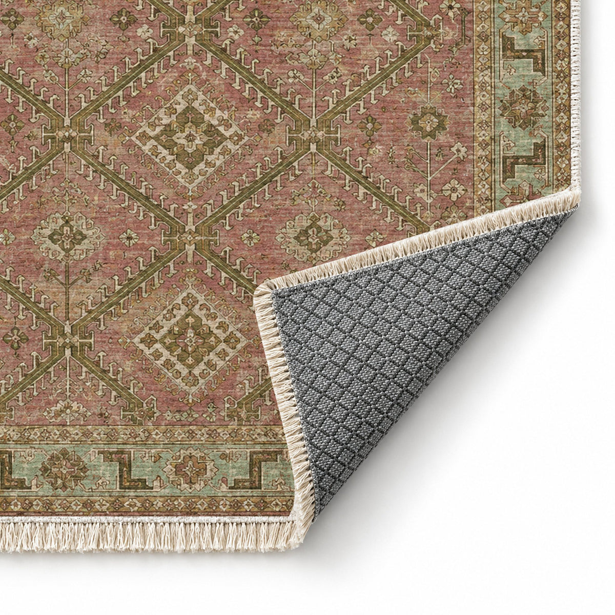 Diamond Rampart Clay & Sage washable rug folded corner showing the backing