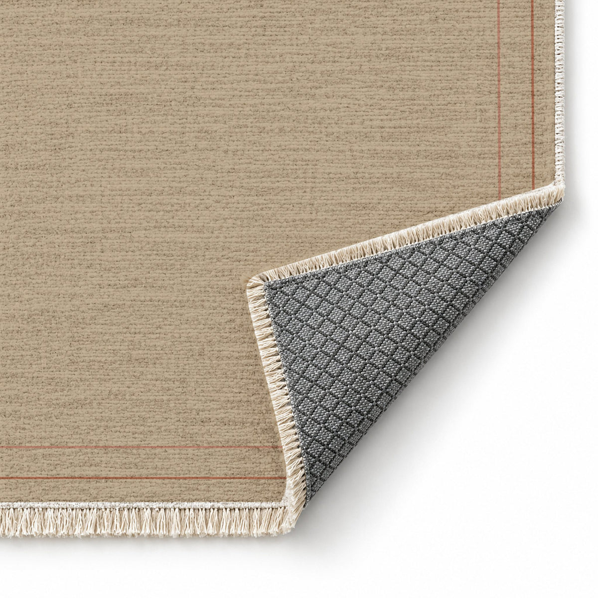 Double Frame Sand & Terracotta washable rug folded corner showing the backing