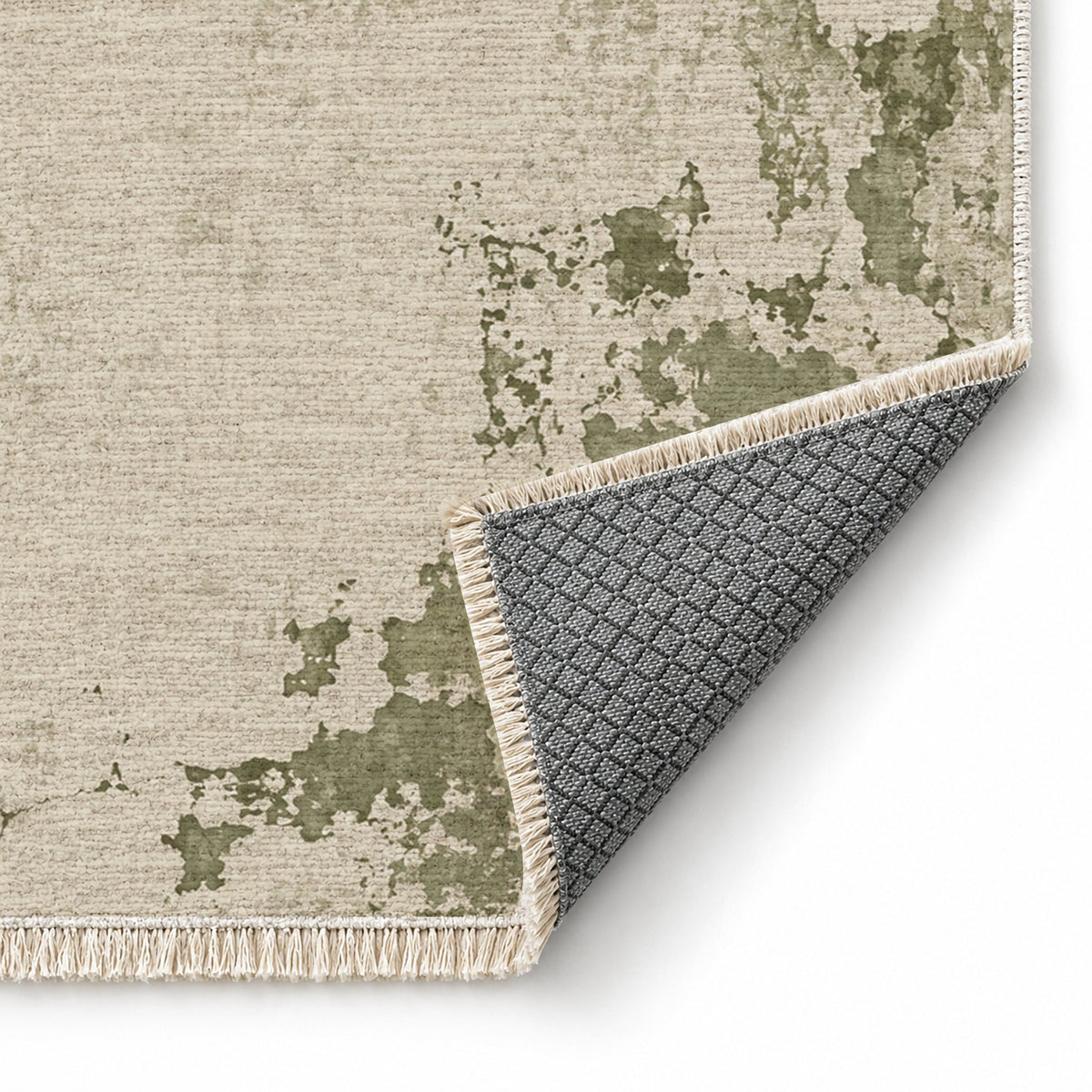 Eroded Fresco Ivory & Sage washable rug folded corner showing the backing
