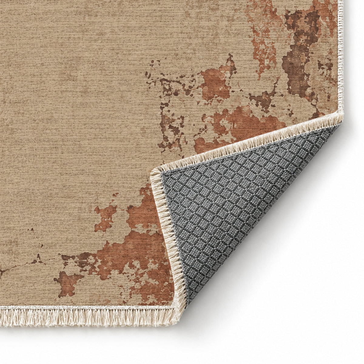 Eroded Fresco Sand & Terracotta washable rug folded corner showing the backing