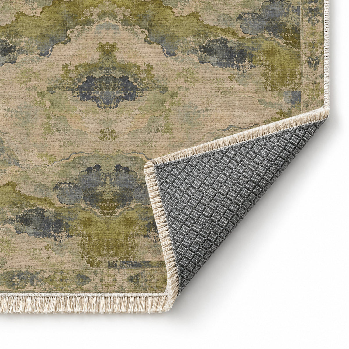 Eroded Horizon Olive & Ochre washable rug folded corner showing the backing
