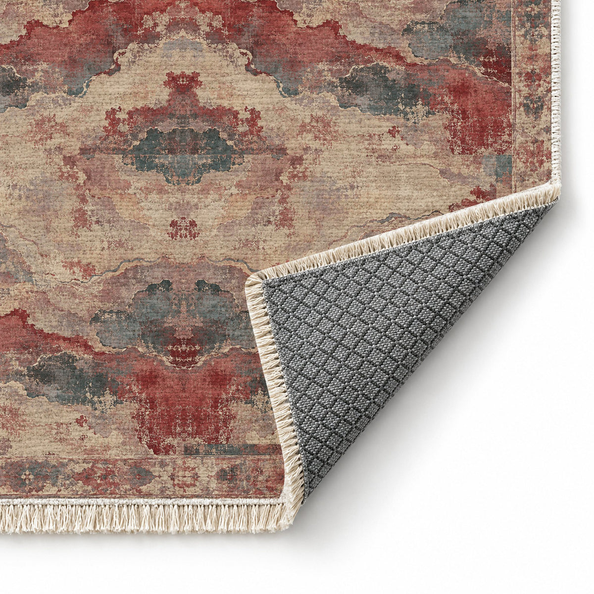 Eroded Horizon Rose & Mineral washable rug folded corner showing the backing